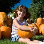 Girl with Pumpkins