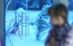 stock-footage-sad-girl-looking-in-window-at-the-snow-covered-playground-thumb-400x224-21445.jpg