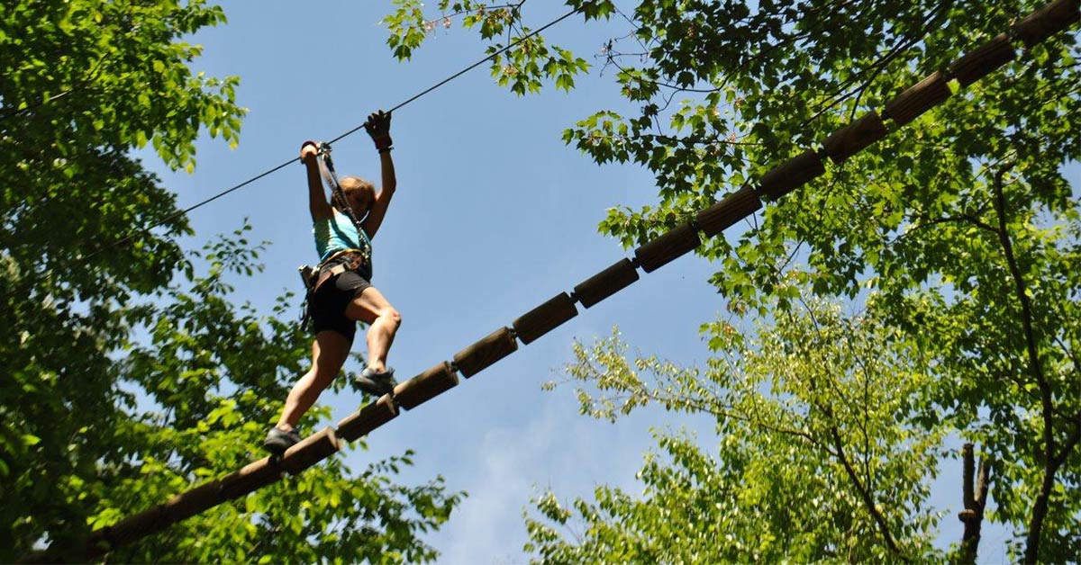 girl on an aerial adventure course