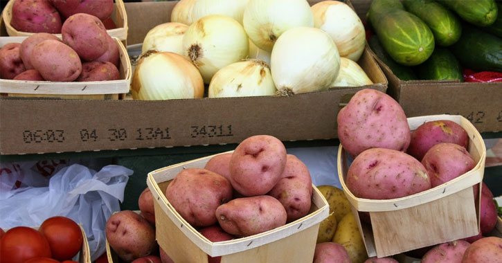 potatoes and other vegetables on display