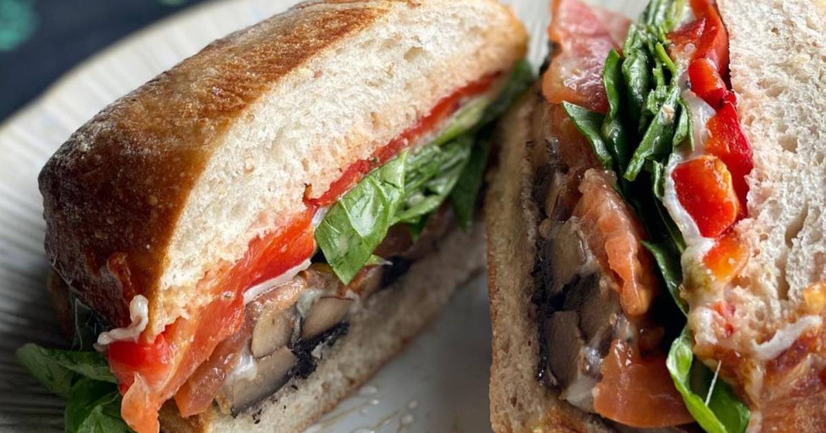 sandwich halves with veggies inside